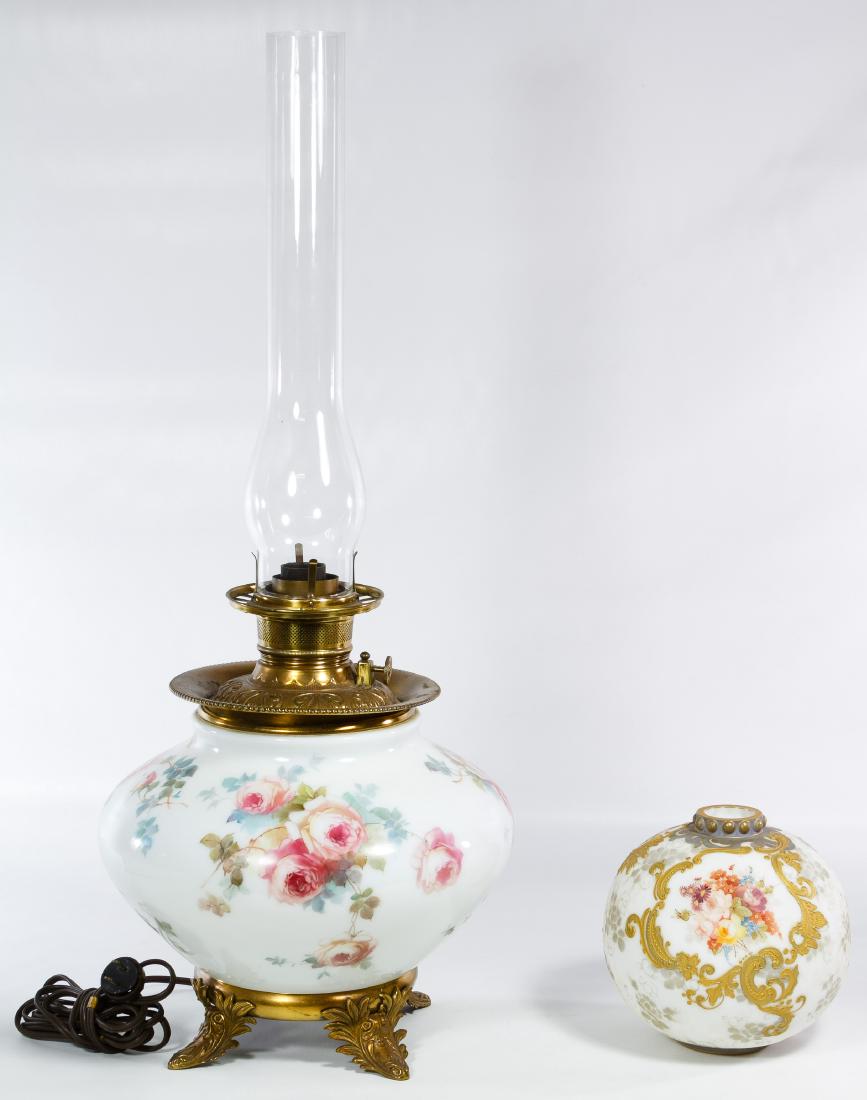 Crown Milano Glass Vase: Crown Milano Glass Vase Having a painted floral motif, marked on the underside; together with an electrified 'Gone with the Wind' oil lamp Height: 28.00 inches (lamp) Category: Decorative Arts > Lamps