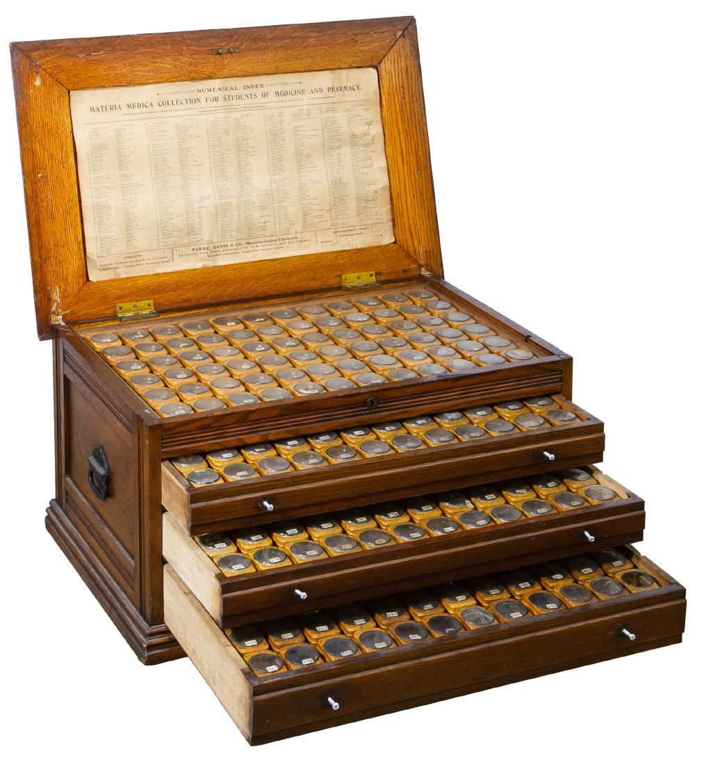 Materia Medica Collection in Oak Chest by Parke, Davis: Materia Medica Collection in Oak Chest by Parke, Davis Co. c.1890; collection for use by students of medicine and pharmacy stored in a hinged top case having three drawers holding 270 out of the origi