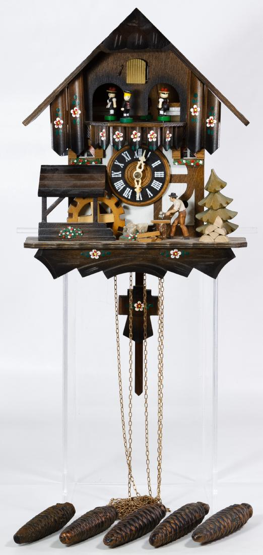 D. Hones German Wood Cuckoo Clock: D. Hones German Wood Cuckoo Clock Having four dancing figures, a water wheel, a Swiss chalet style building, five weights and the pendulum Height: 12.00 inches, Width: 10.00 inches Category: Decorativ