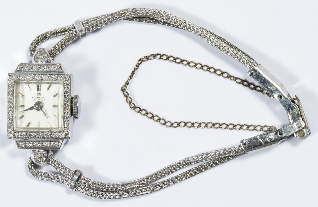 Bucherer 18k White Gold and Diamond Case Wrist Watch: Bucherer 18k White Gold and Diamond Case Wrist Watch Having a twenty-one jewel Swiss movement on a gold filled band; marked '18k' and '.750' inside back cover Length: 6.00 inches Weight: 0.42 ozt. (to