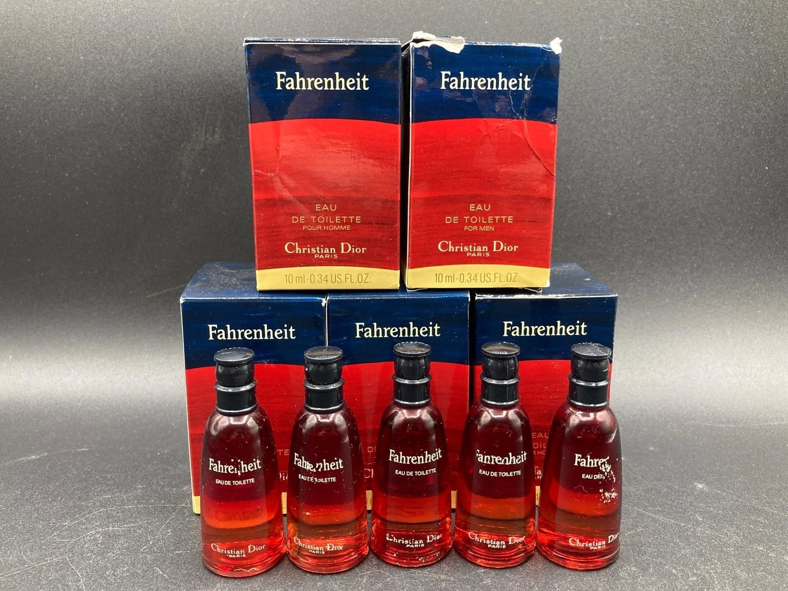 Five Fahrenheit By Christian Dior 10ml Colognes: Set of five 10ml bottle of Fahrenheit by Christian Dior cologne bottles. All bottles unopened, some bottles have wear to lettering on front as noted in photos.