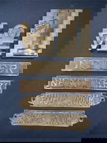 Brass Paperweights And Door Plaques