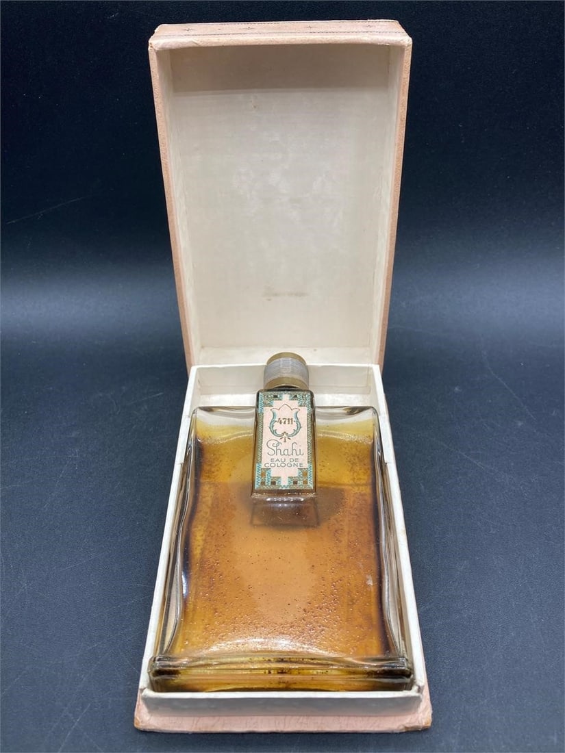 Vintage Shahi 4711 cologne bottle with original box and United States armed forces gift: Vintage Shahi 4711 cologne bottle with original box and United States armed forces gift certification. Bottle has significant residue inside, otherwise bottle and box are in good condition.Measurement