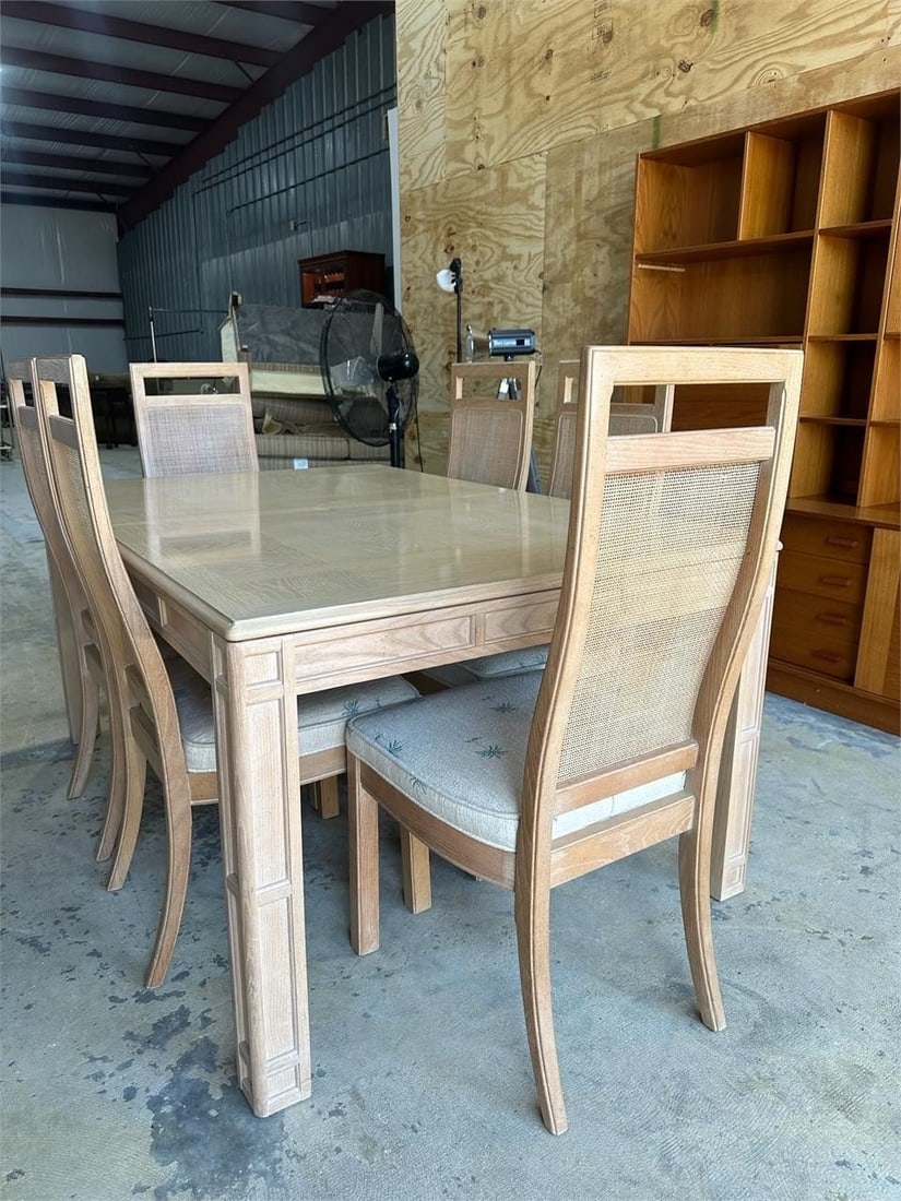 Dining Room Table Set W/ 6 Chairs: Wood dining room table and six chair set. Cream color with visible natural grain and coastal themed upholstered chairs. Set is in good condition.Measurements: 48" W, 96" L, 30" H, 200 pounds