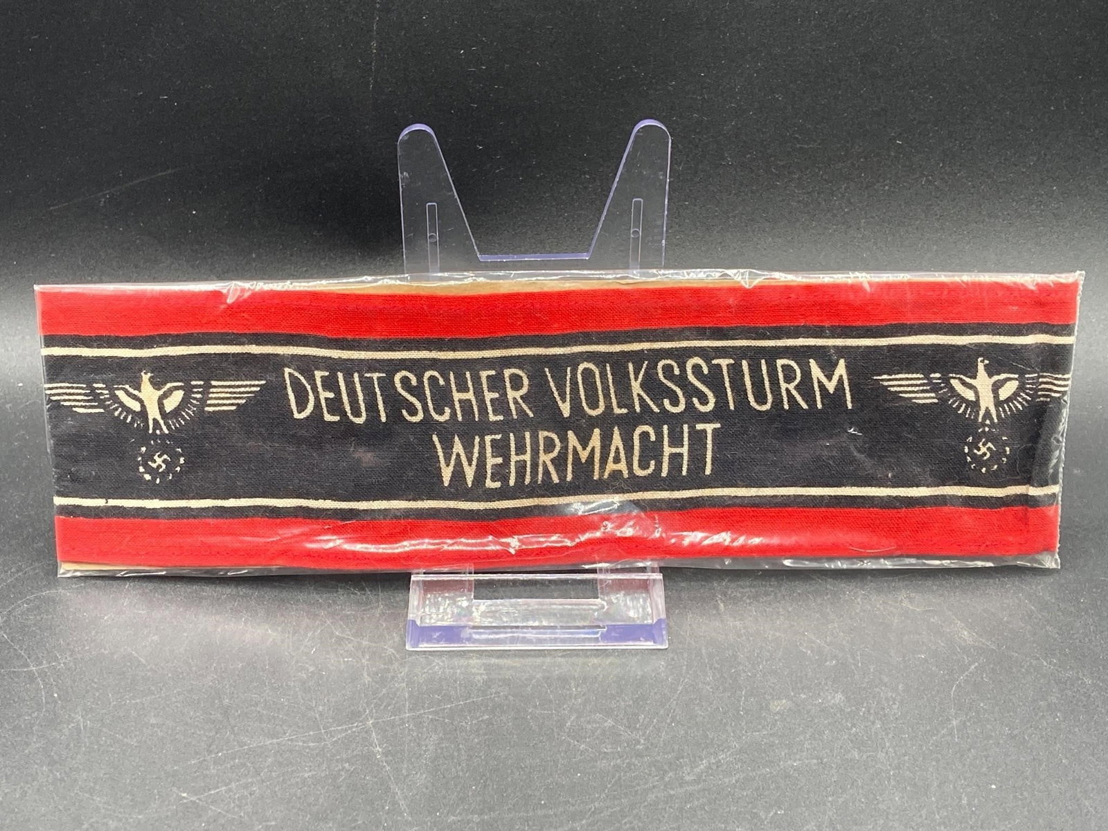 WWII Deutscher Volkssturm Wehrmacht Armband: Original German world war II Deutscher Volkssturm Wehrmacht armband. Introduced in late 1944 for civilian units. Item is in excellent condition.Measurements: 3" W, 9" L, 1" H, 1 pound