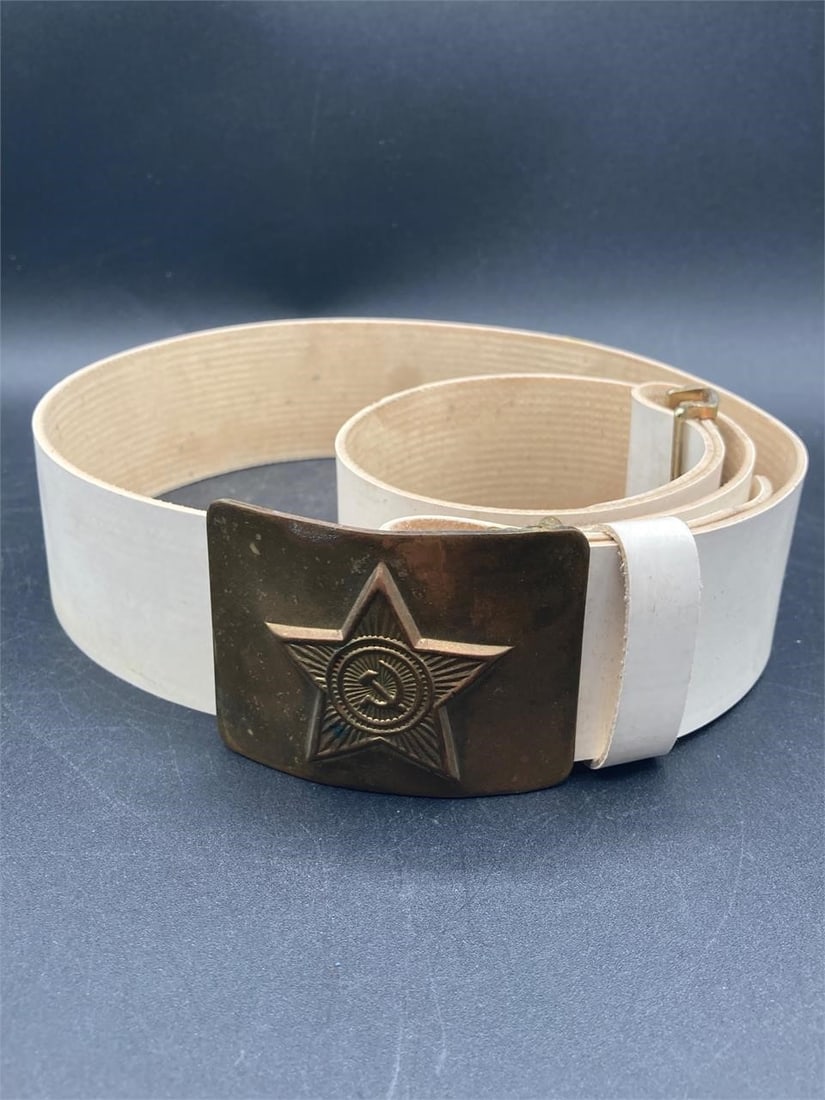 Soviet Union Ceremonial Ground Forces Belt: Vintage Soviet Union ceremonial ground forces belt. Brass belt buckle with Soviet hammer & sickle emblem on white leather belt. Item is in good condition.Measurements: 5" W, 5" L, 2" H, 1 pound