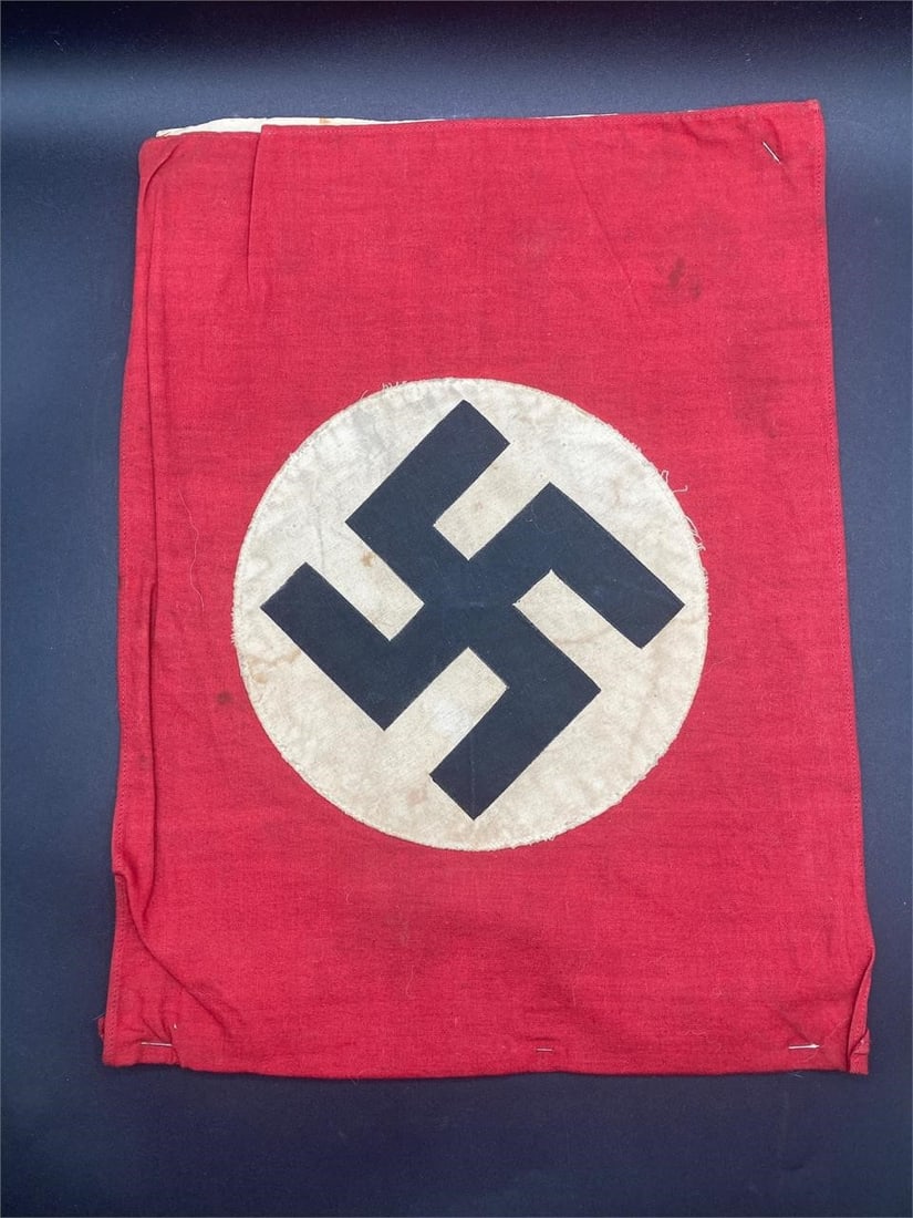 11x14" German WWII NSDAP Flag: 11x14" size world war II German NSDAP flag. Cotton material with stitched on center NSDAP symbol on both sides. Some light wear and stains, particularly on NSDAP patch areas, overall flag is in good p