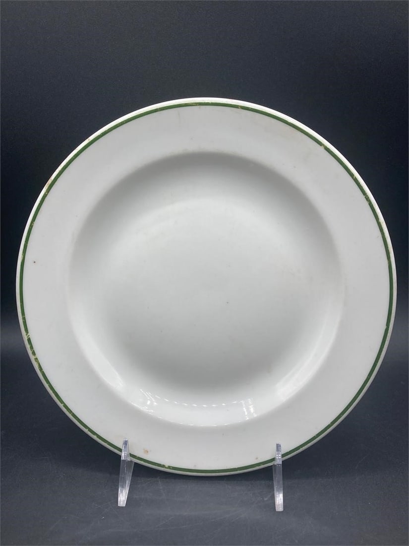 German WWII Deutsche Arbeits Front Plate: German world war II Deutsche Arbeits Front porcelain mess hall plate. DAF maker stamps noted on bottom of plate. Measures 9" across. Some light scratches and marks, overall plate is in good condition.