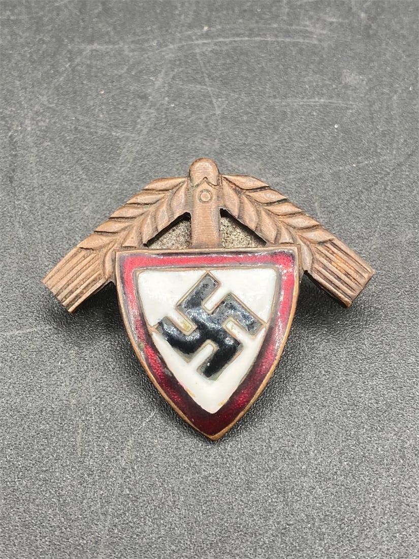 German WWII National Labor Corps Badge: German world war II national labor corps badge. Screw back style with enameled NSDAP shield front. Measures 1 1/2". GES GESCH stamps on back noted in photos. Some light wear to enameling, otherwise it