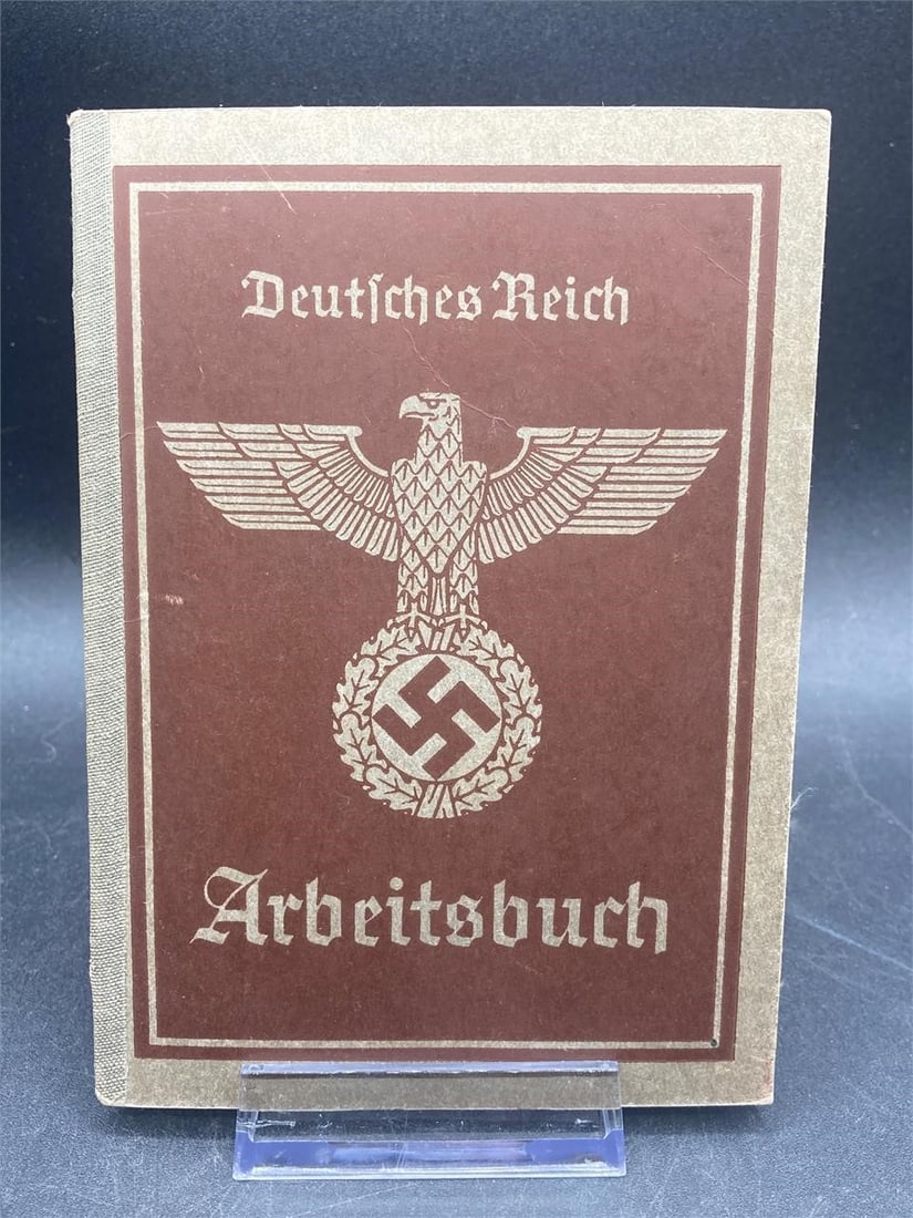 WWII German Deutsches Reich Arbeitsbuch Work Book: Original world war II German Deutsches Reich Arbeitsbuch work book papers. Dated February 1935 on cover page with hand written logs on some pages as noted in photos. Item is in excellent condition.Mea