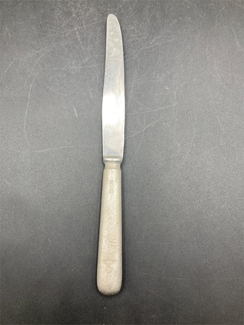 WWII German Mess Hall Knife: World war II era German mess hall knife. HMZ38 and NSDAP stamps noted in photos. Measures 9" long. Some light wear, otherwise item is in good condition.Measurements: 1" W, 9" L, 1" H, 1 pound