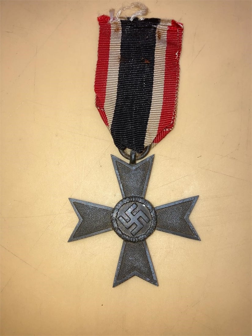 WWII German War Merit Cross 2nd Class: German world war II war merit cross 2nd class, without swords. Zinc material. This award was created by Adolf Hitler in October 1939 as a successor to the non-combatant Iron Cross which was used in ea