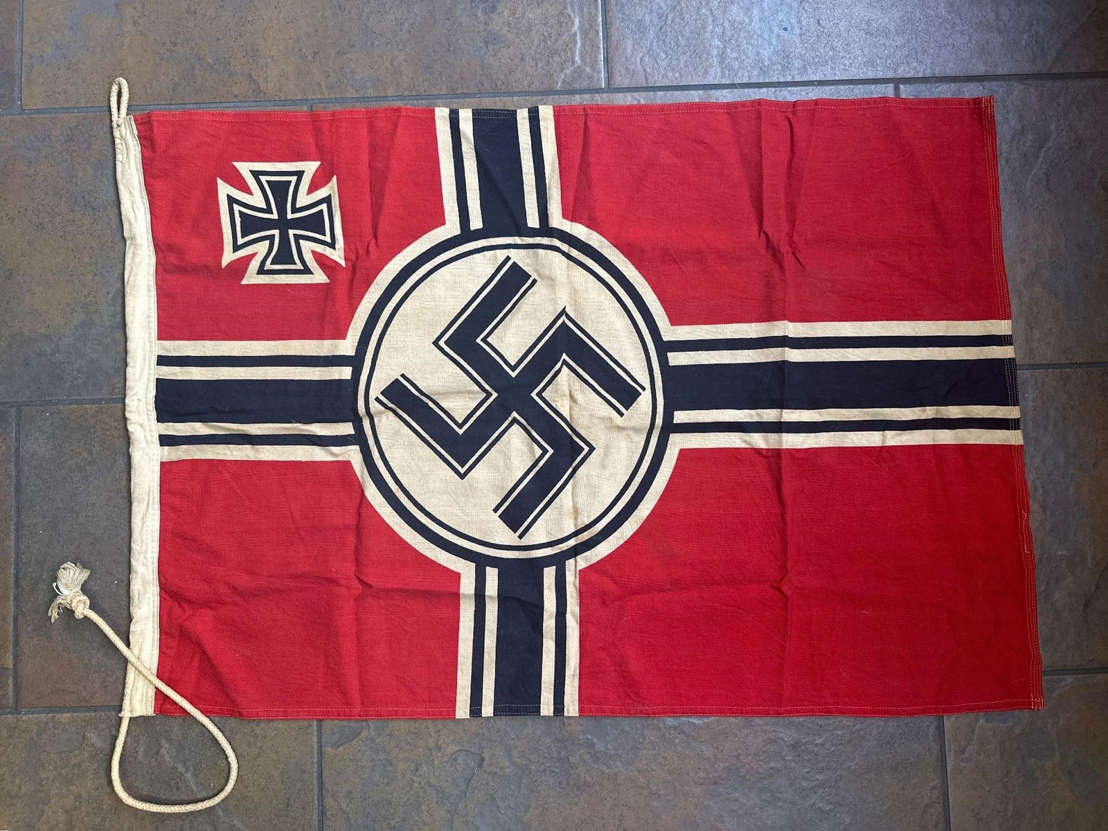 WWII German Kriegs Flag: Features reinforced edge, and loop on top for affixing to a mast. Loop is absent from bottom. No makers markL 36" W 24.5"
