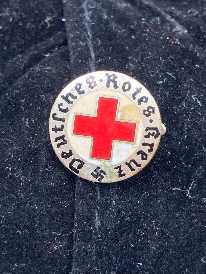 WWII German Red Cross Member Pin: World War II NSDAP German DRK Red Cross member lapel pin. GES GESCH stamp on back noted in photos. Measures 5/8". Some light staining on front, overall pin is in good condition.Measurements: 1" W, 1"