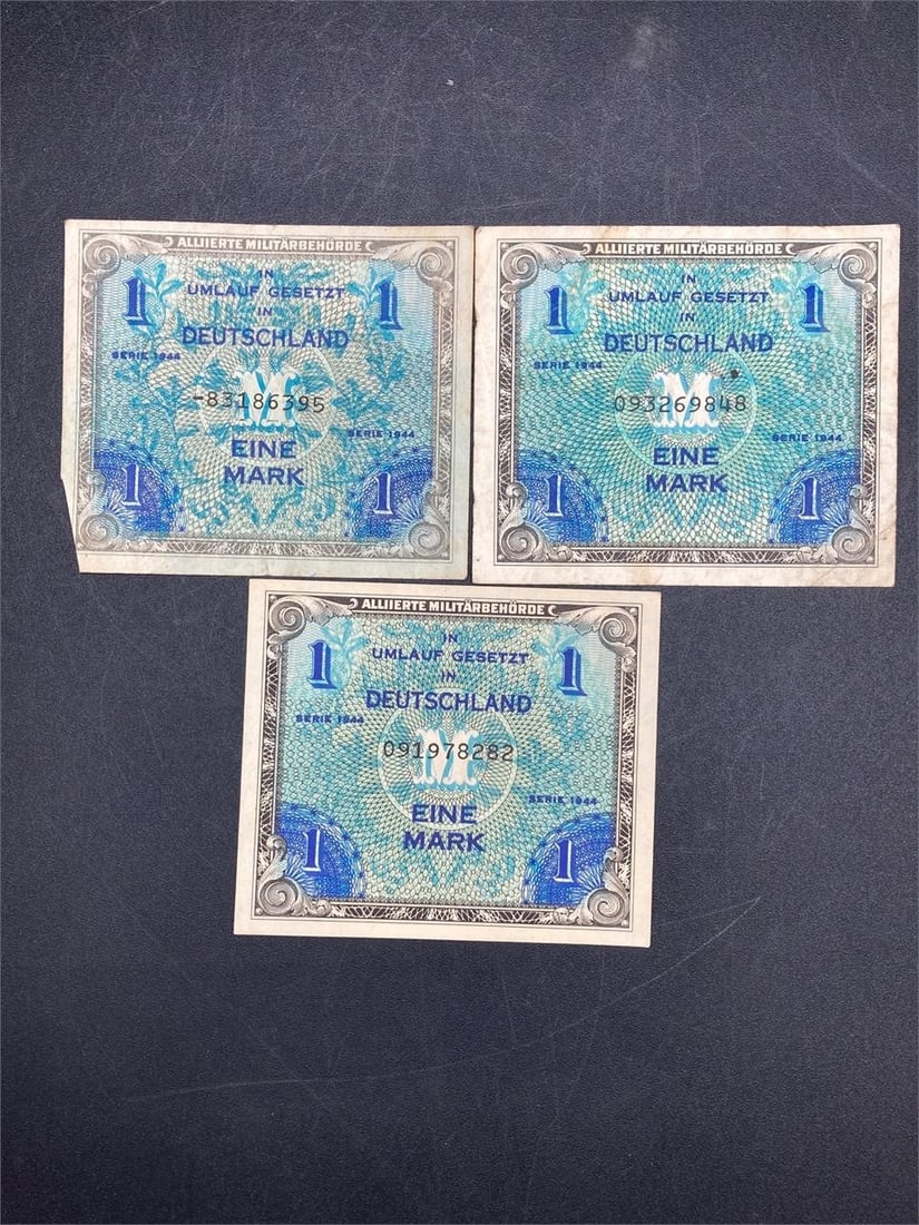 1944 Allied Military 1 Mark Bank Notes: Set of three 1944 Allied military one mark bank notes. Ungraded, two notes are in very good condition, one has some wear and creasing.Measurements: 4" W, 4" L, 1" H, 1 pound