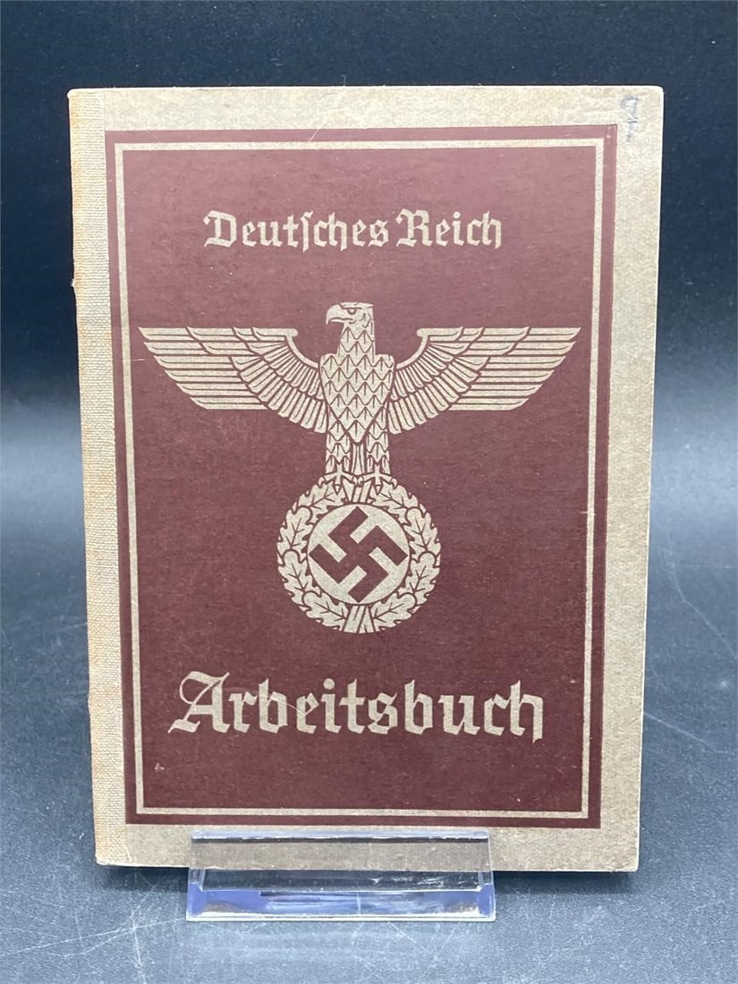 WWII German Deutsches Reich Arbeitsbuch Work Book: Original World War II German Deutsches Reich Arbeitsbuch work book papers. Dated February 1935 on cover page with hand written logs on some pages as noted in photos. Item is in excellent condition.Mea