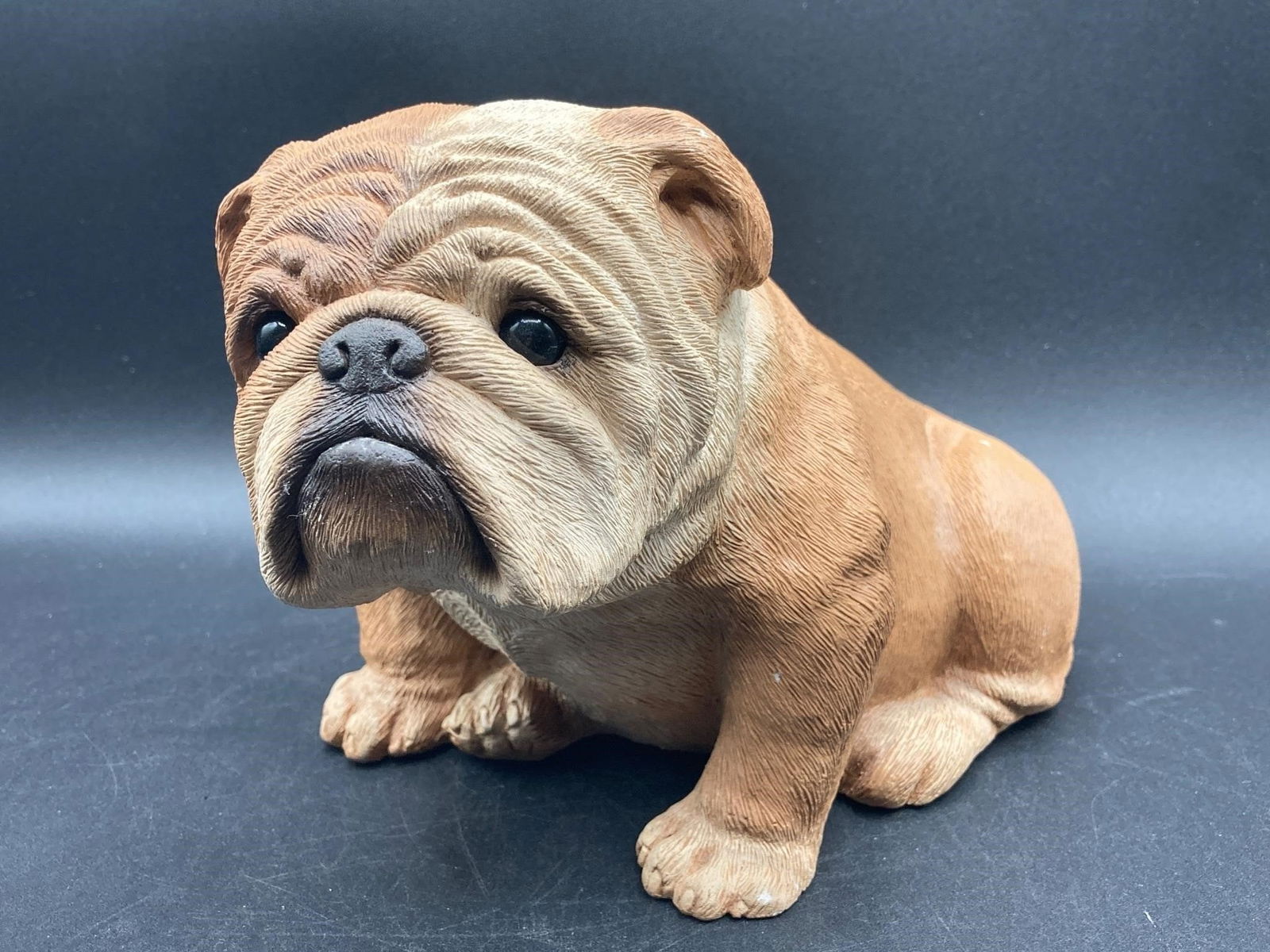 Vintage Sandicast Bulldog Fawn 179 Sculpture: Vintage Sandicast bulldog fawn sculpture, model #179. Hand cast and hand painted model made with great detail. Artist Sandra Brue signature on bottom. Measures 8" long. One area of worn paint noted in