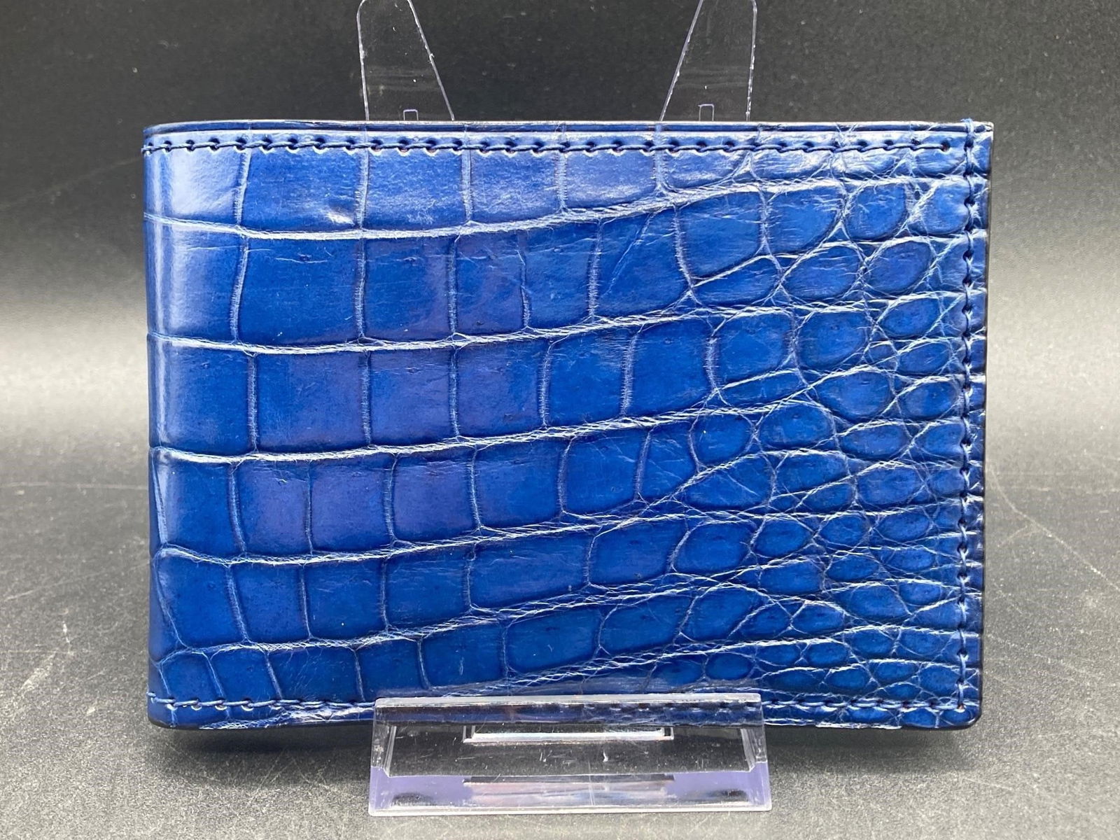 Genuine alligator leather bifold wallet. Cobalt blue colored alligator leather exterior with brown (1 of 4)