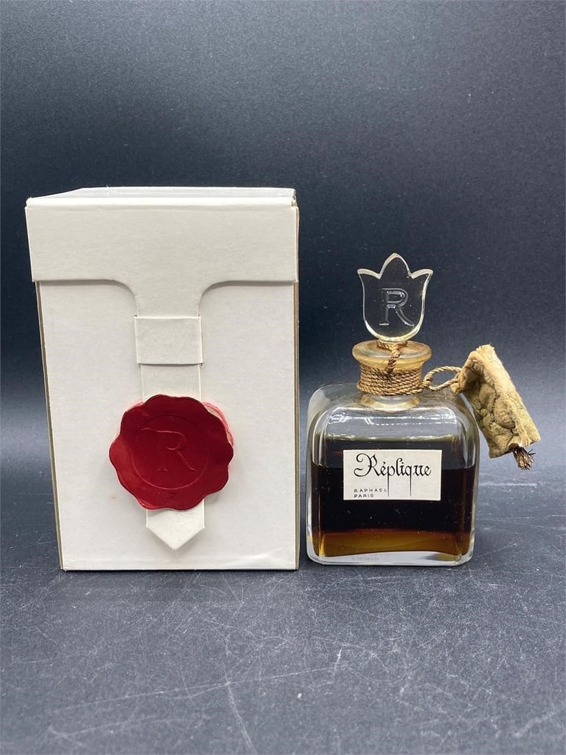 Vintage 1940s Replique by Raphael 2 ounce perfume with box. Bottle features well preserved original (1 of 7)