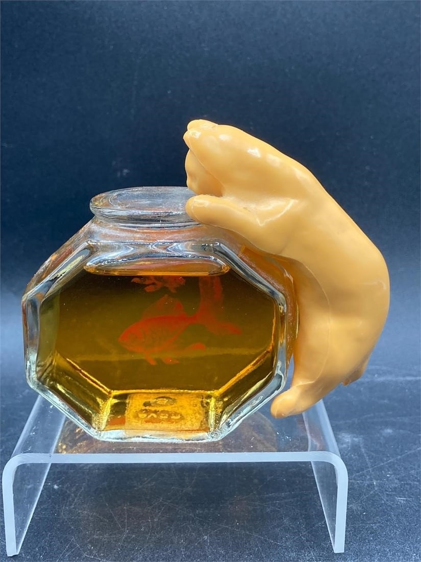 Avon curious kitty 2.5 ounce perfume. Full, unopened bottle with original cat figure. Good (1 of 4)