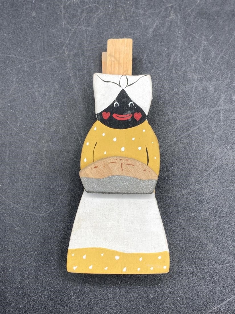 Vintage Black Americana Recipe Holder: Vintage black Americana recipe holder. Circa 1950s. Hand painted wood figure on clothespin. Measures 3" long. Item is in good condition.Measurements: 1" W, 2" L, 3" H, 1 pound