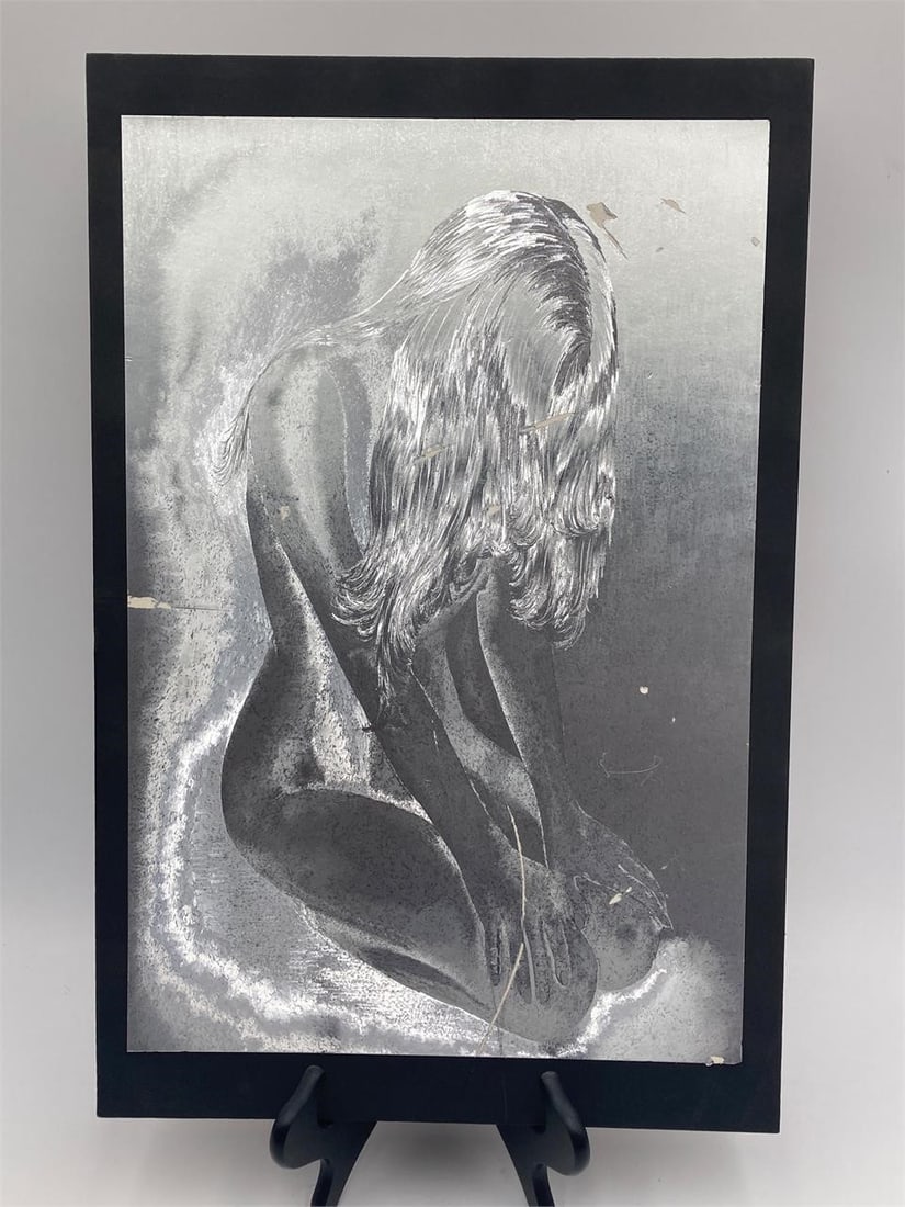 14x21" Nude Woman Foil Art: Vintage 14x21" nude woman foil art on paperboard. Intricately detailed etched foil of kneeling nude woman. Artist unknown. Some areas of scarring and tears noted in photos. Unique find.Measurements: 1