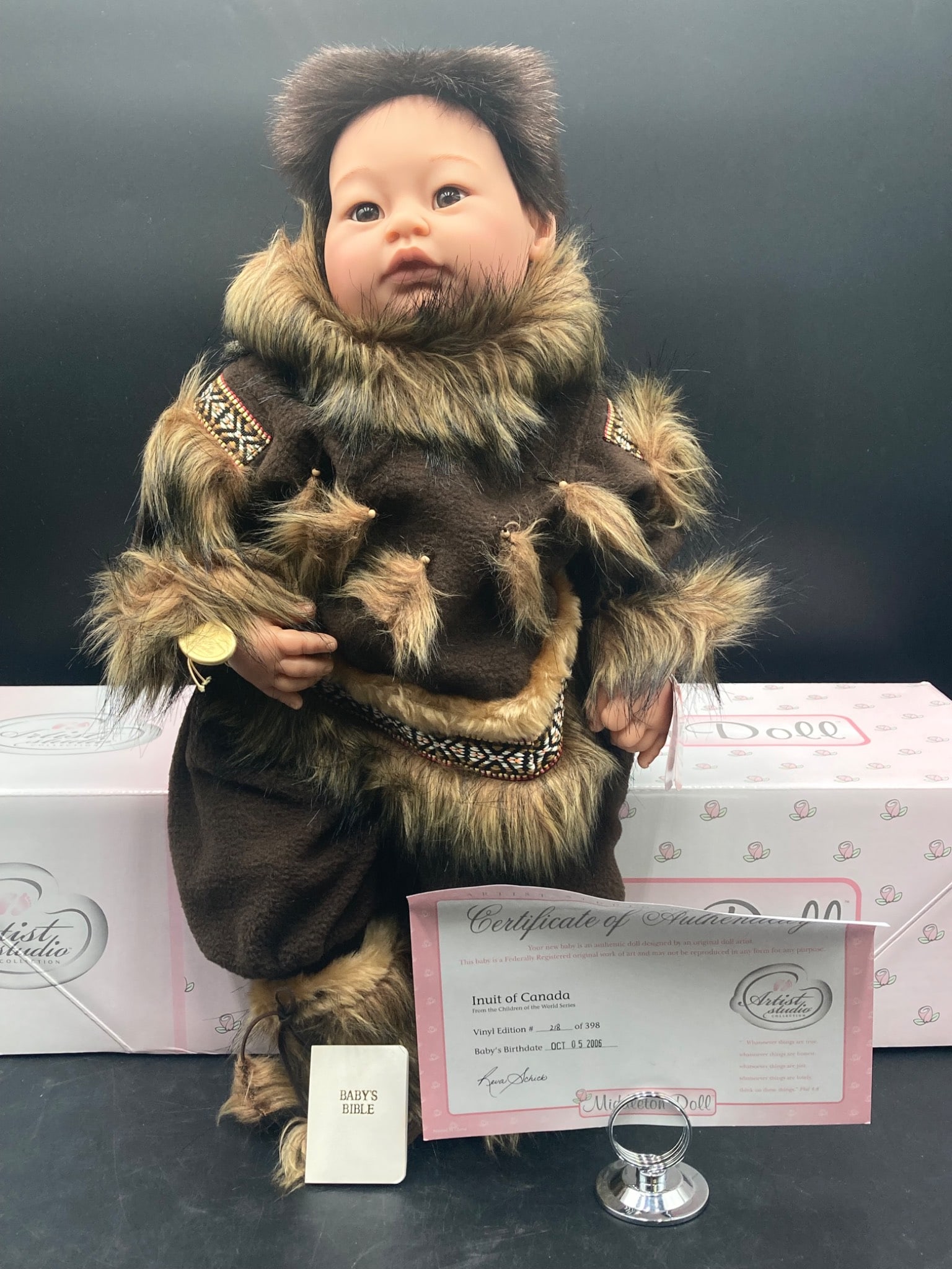 Middleton Doll Inuit of Canada Baby Doll: This listing is for a Middleton Doll Inuit of Canada baby doll from the Artist Studio Collection. This doll is a limited edition with a vinyl edition number of 218 of 398 and the body's listed birthda