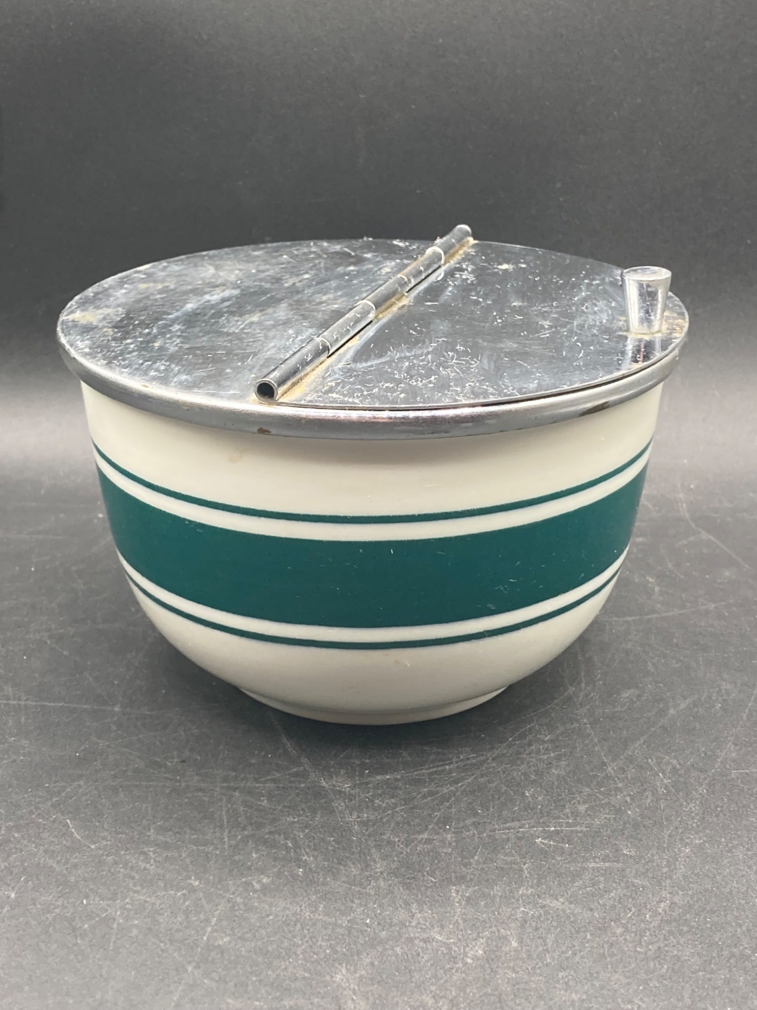 Vintage Jackson China Lidded Sugar Bowl: This is a vintage Jackson China sugar bowl produced for Measuring Device Corp., New York. The bowl features a white glaze exterior with two horizontal teal green stripes and a fitted, hinged metal lid
