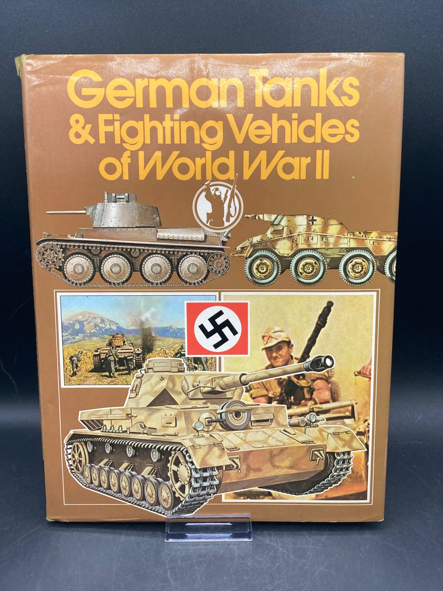 German Tanks And Fighting Vehicles Of World War II Book: Hardcover book detailing German tanks and fighting vehicles used during World War II. Features detailed illustrations, text descriptions, and photographs. The book includes sections on design, specifi