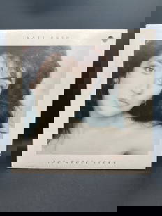 Kate Bush 'The Whole Story' Vinyl Album: This is the 1986 release of 'The Whole Story' vinyl album by Kate Bush, distributed by EMI America. The catalog number is PWAS-17242. The album includes iconic tracks such as 'Wuthering Heights (New
