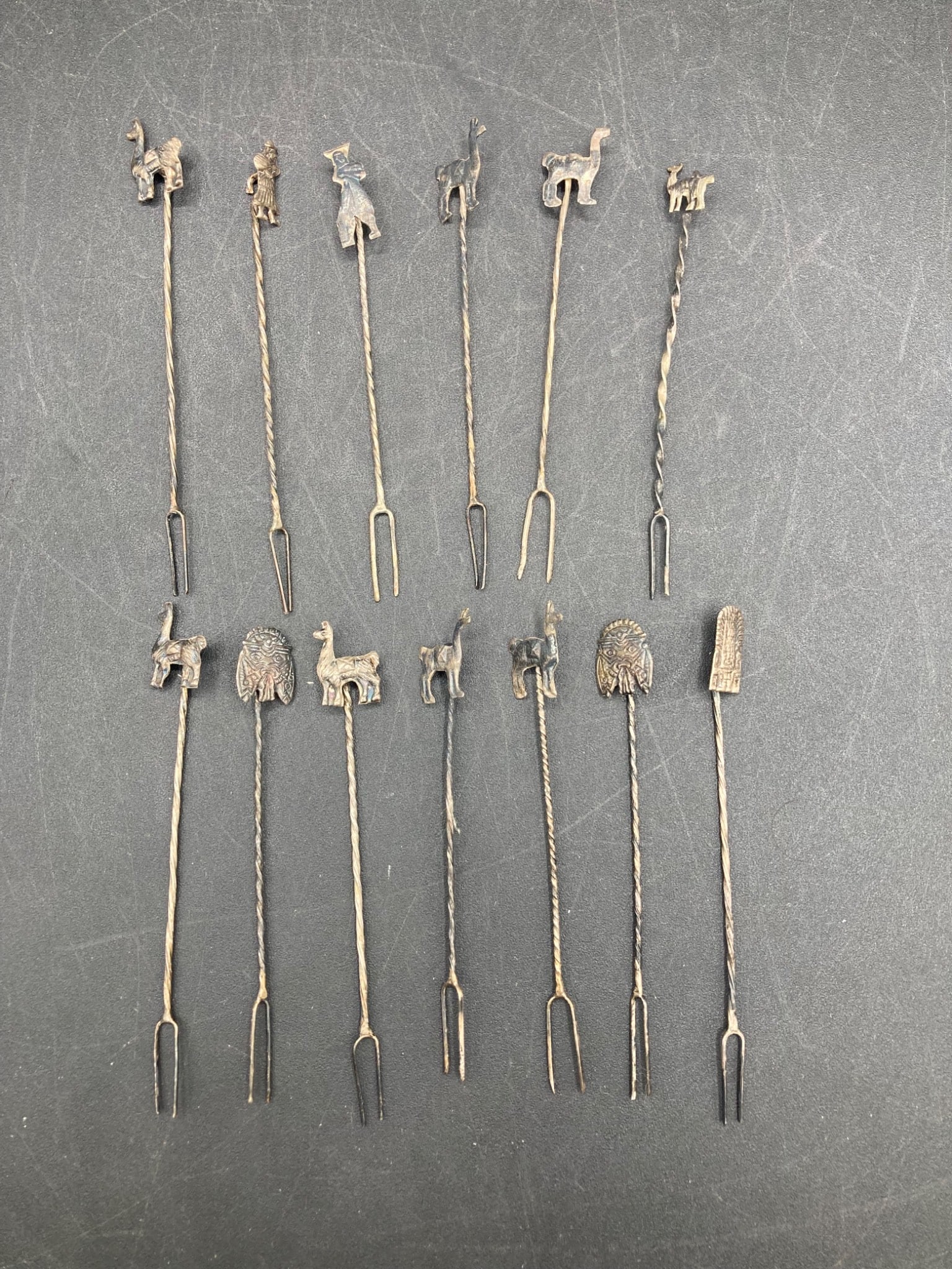 Thirteen Peruvian Sterling Silver Hors d'Oeuvres Forks with Ornamental Designs (1 of 8)