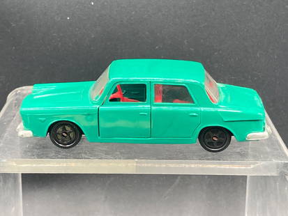 Mebetoys 1/43 Lancia Flavia Model Toy Car: This listing features a Mebetoys model of a Lancia Flavia in 1/43 scale. Made in Italy, this car includes notable design elements such as opening doors, a detailed red interior, a metal base stamped w
