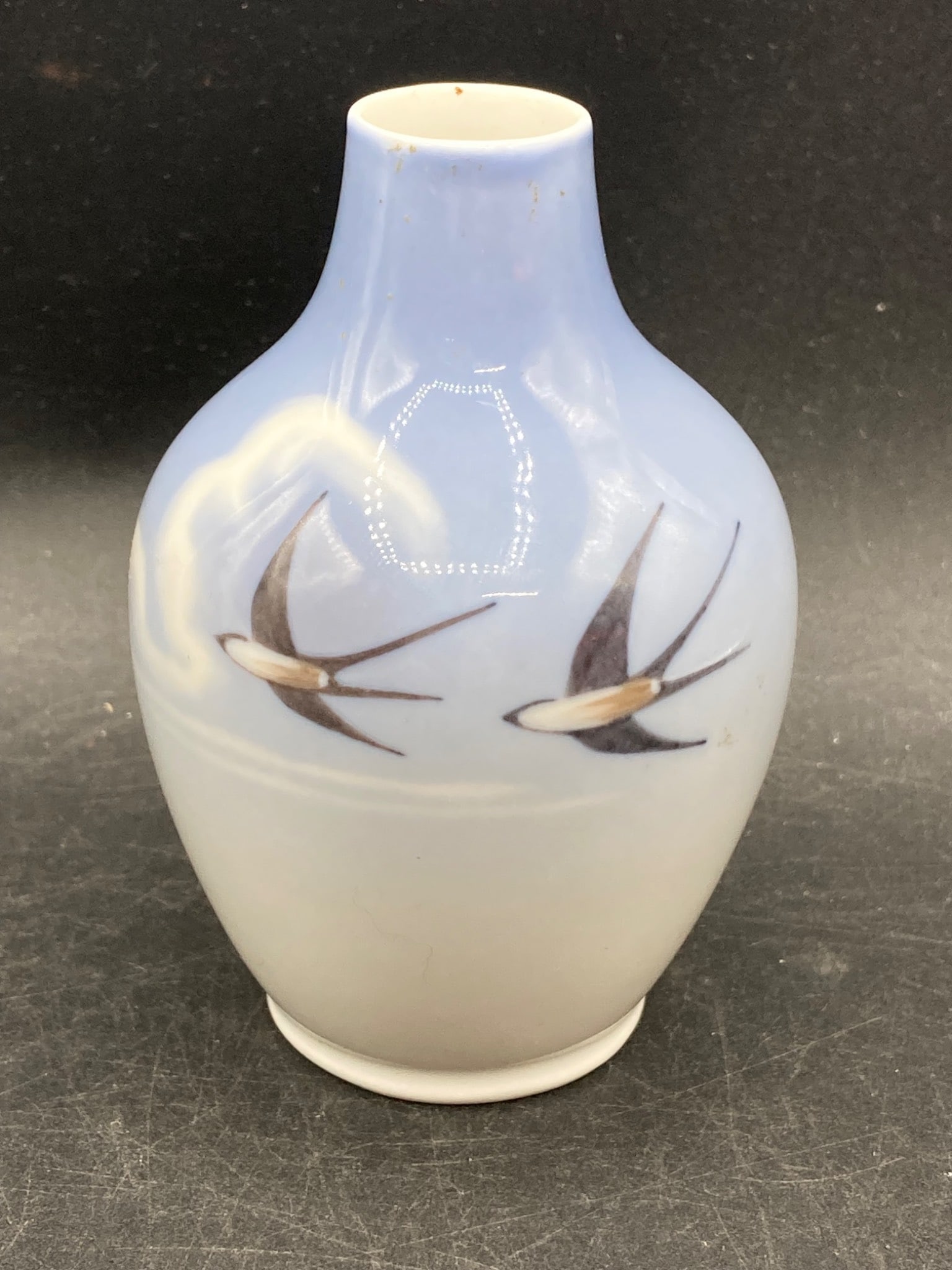 Royal Copenhagen Miniature Vase With Swallow Motif No. 2671/227: This is a miniature vase from Royal Copenhagen, Denmark, featuring their hallmark hand-painted swallow motif design. The item's hallmark includes the Royal Copenhagen mark, confirming its authenticity