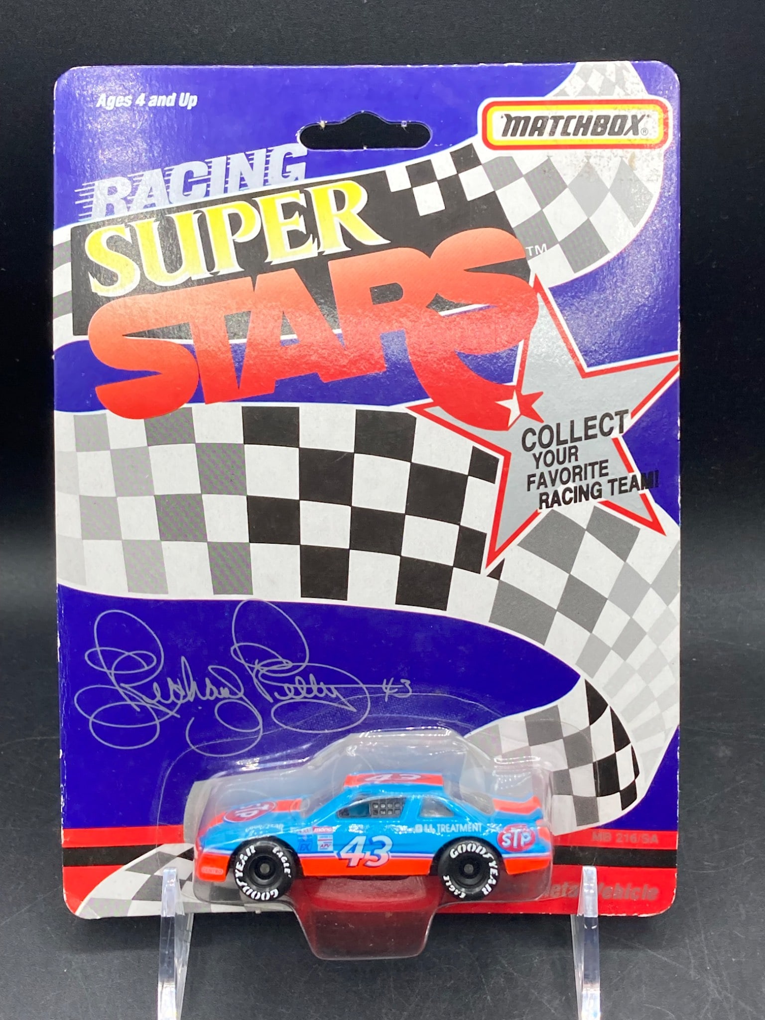 Vintage Matchbox Racing Super Stars 1/64 Kyle Petty Stock Car Die Cast: This is a Matchbox Racing Super Stars 1/64 die-cast model of Kyle Petty's stock car, featuring the iconic STP #43 design. The packaging includes collector-specific branding and Kyle Petty's printed si