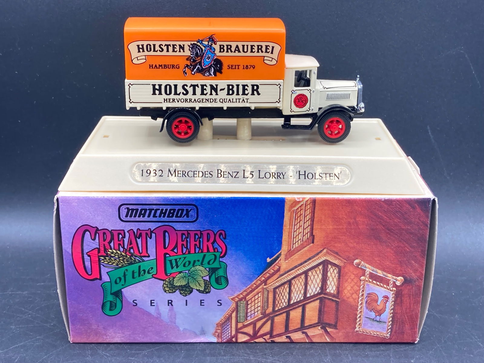 Matchbox Great Beers Of The World 1932 Mercedes Benz L5 Lorry Holsten Die Cast: This listing features a Matchbox model of the 1932 Mercedes Benz L5 Lorry, part of the Great Beers of the World series. The die-cast truck showcases Holsten Brauerei branding with the iconic 'Holsten-