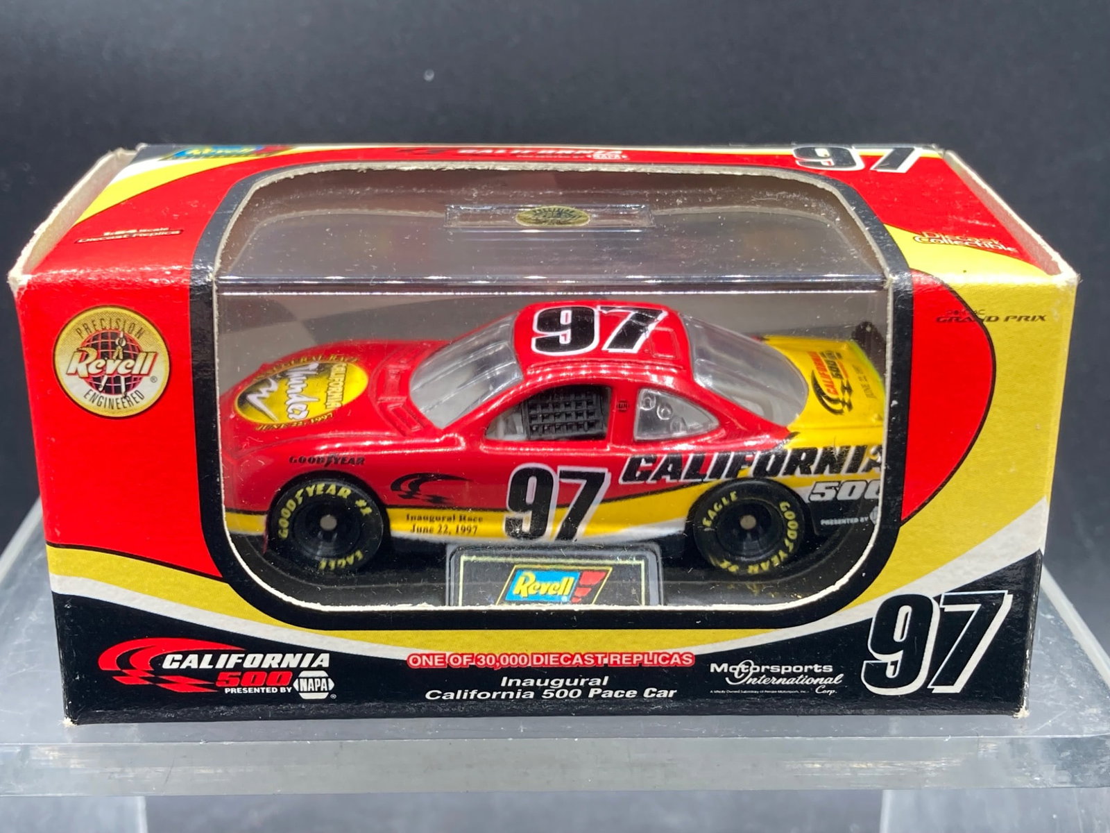 Revell 1:64 Scale 1997 California 500 Pace Car Die-Cast Model: Revell die-cast model of the 1997 California 500 Pace Car in 1:64 scale. Representing the inaugural race dated June 22, 1997, this Pontiac Grand Prix model is part of the Motorsports Authentics collec