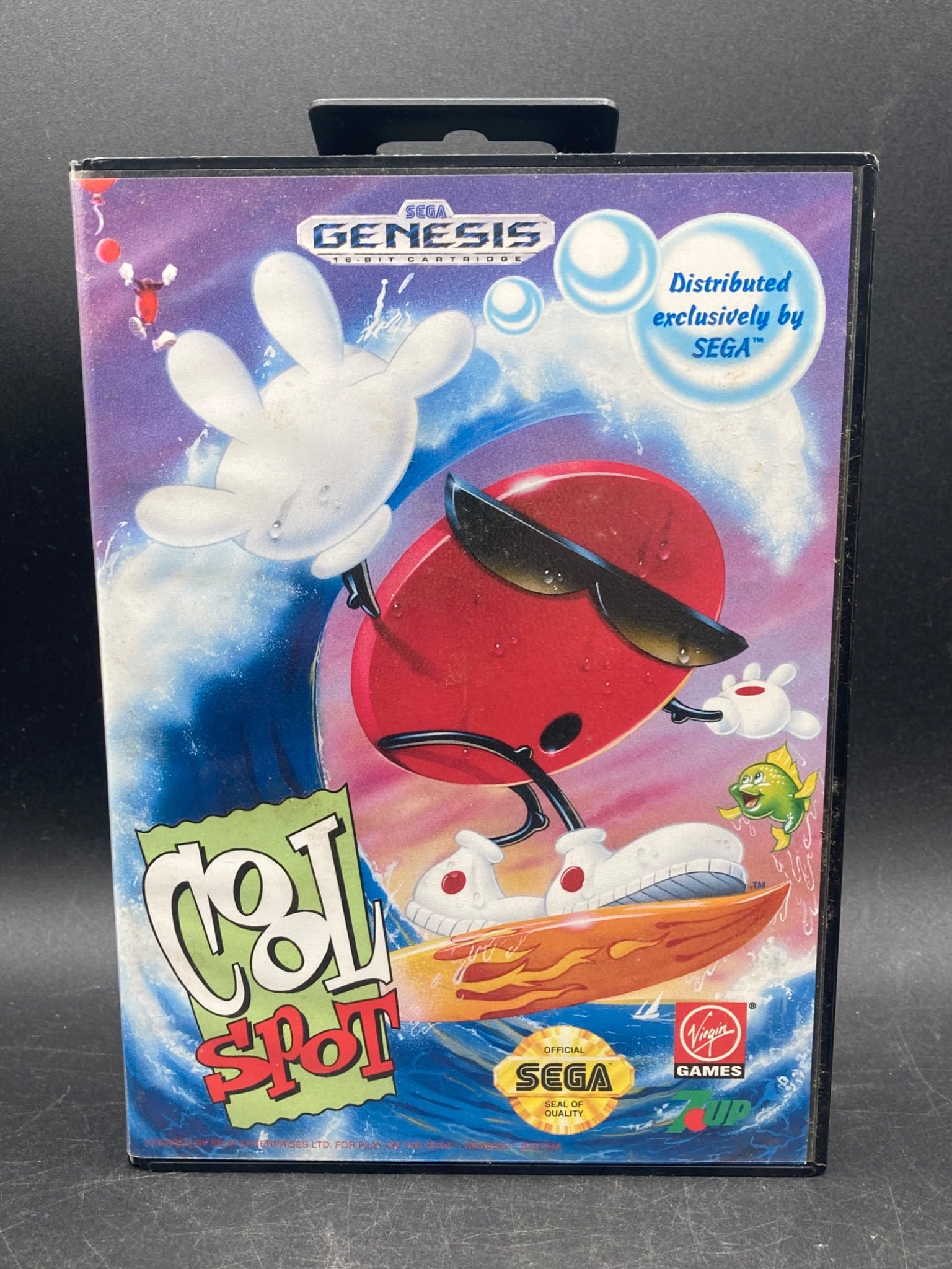 Cool Spot for Sega Genesis with Original Box and Manual: Cool Spot video game cartridge designed for Sega Genesis. Includes original clamshell case, instruction manual, and cartridge. Manufactured by Virgin Games, SEGA product number MK-1033. Region format 