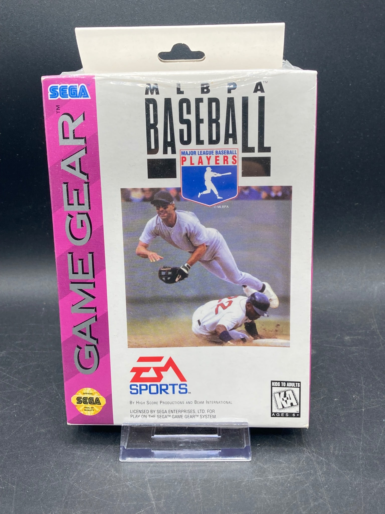 MLBPA Baseball for Sega Game Gear, Factory Sealed: This lot includes the 'MLBPA Baseball' video game for Sega Game Gear, published by EA Sports, sealed in original plastic. It is complete in its original box with detailed artwork. The item is designed
