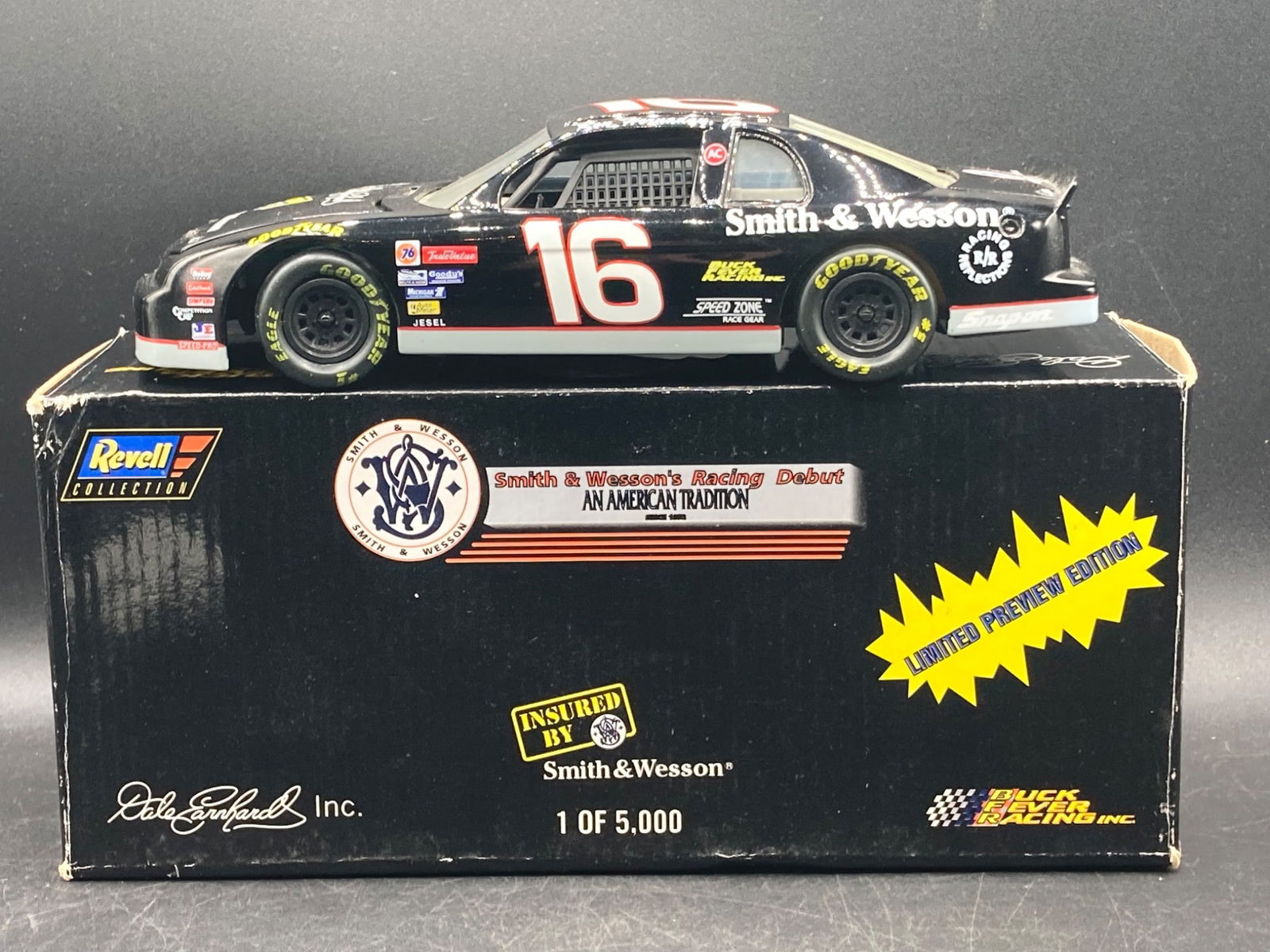 Revell 1/24 Ron Hornaday Jr Smith & Wesson NASCAR Die-Cast Model: This is a 1:24 scale die-cast model by Revell, depicting Ron Hornaday Jr's NASCAR race car, sponsored by Smith & Wesson. The car bears racing number 16 and is branded with its Monte Carlo design. Limi