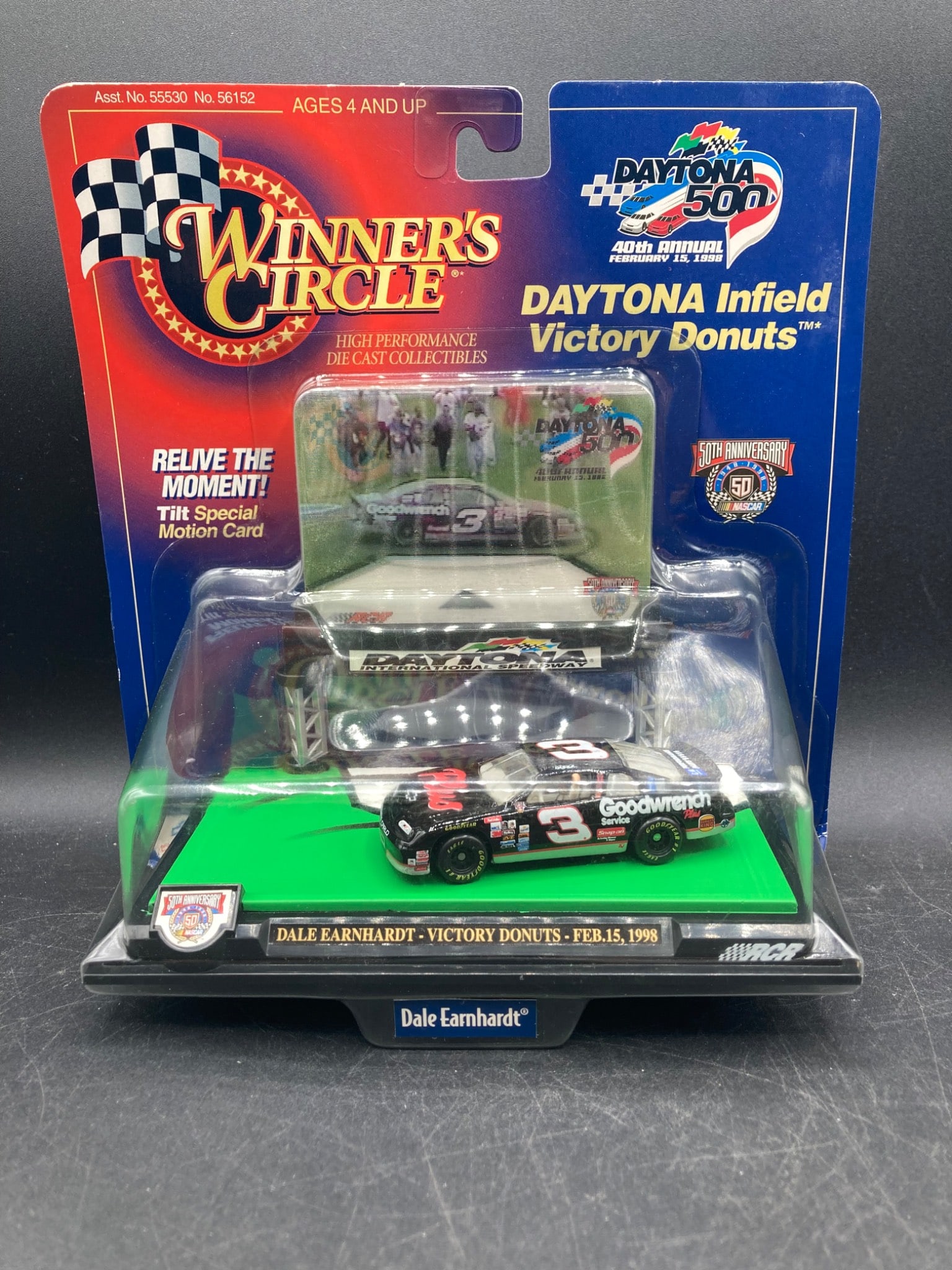 Winner’s Circle 1998 Daytona 500 Dale Earnhardt Infield Victory Donuts Die-Cast Model: This is a 1:64 scale die-cast NASCAR replica of Dale Earnhardt's #3 Goodwrench Service Plus Chevrolet from the 1998 Daytona 500, produced by Winner's Circle. Featuring an infield 'Victory Donuts' scen