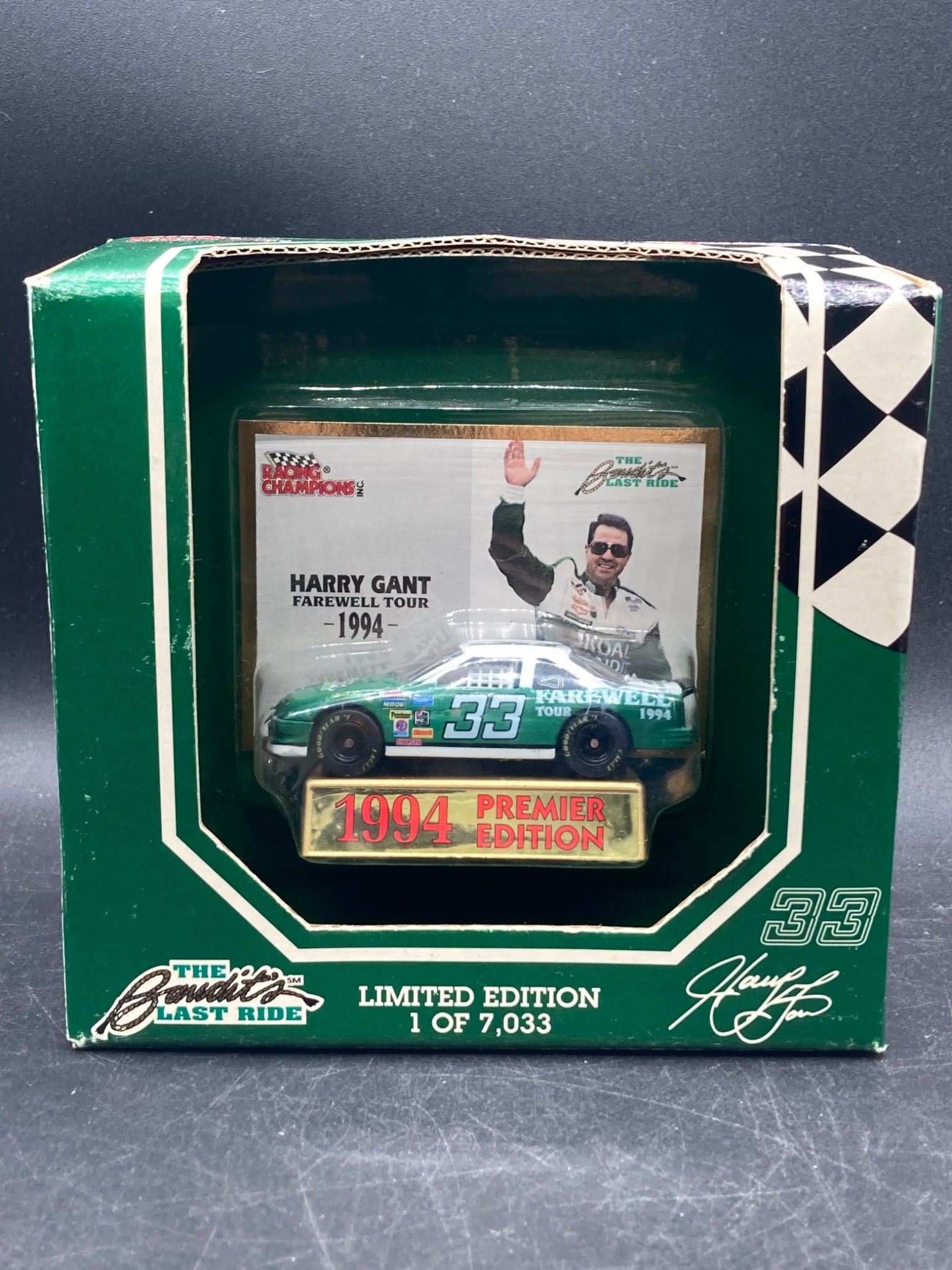 Racing Champions 1:64 Scale 1994 Harry Gant NASCAR Die Cast Premier Edition: This limited edition Racing Champions die-cast model commemorates Harry Gant's 1994 farewell tour. It is a 1:64 scale model of car #33 featuring authentic sponsor decals and paint markings. Marked as 