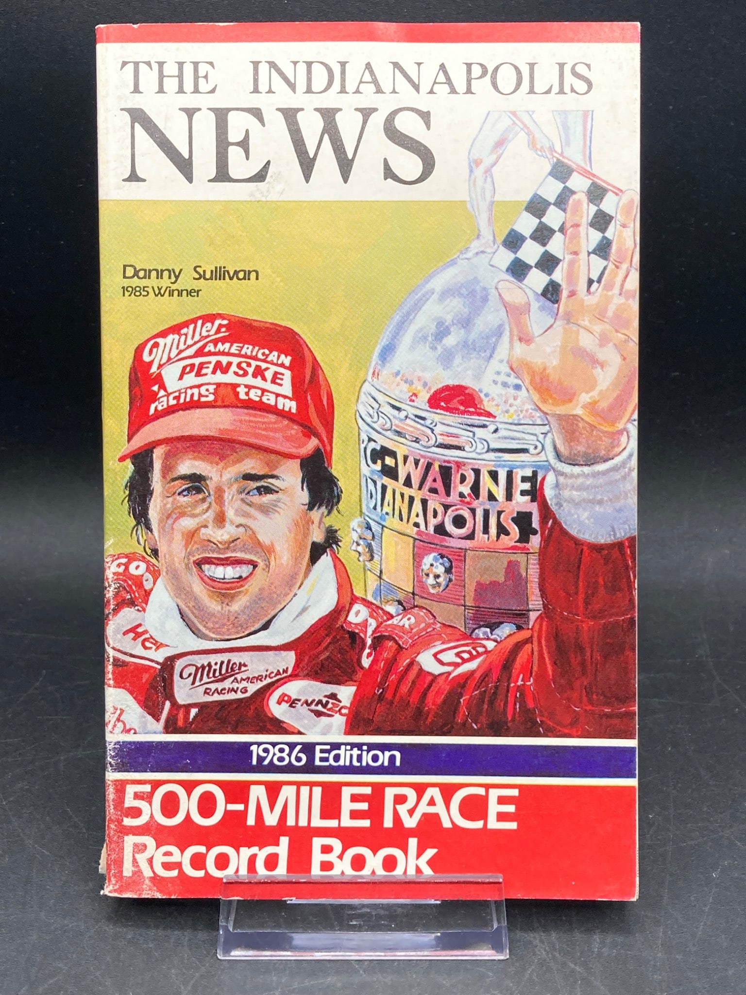 The Indianapolis News 1986 Edition 500-Mile Race Record Book: This is the 1986 edition of ‘The Indianapolis News 500-Mile Race Record Book’ by Bill Pittman. The book provides detailed records and statistics for the Indianapolis 500, including pole position w