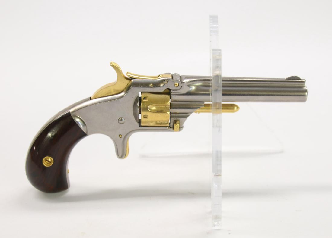 SMITH AND WESSON REVOLVER: .22CAL - SER# 26705 - GOLD PLATED