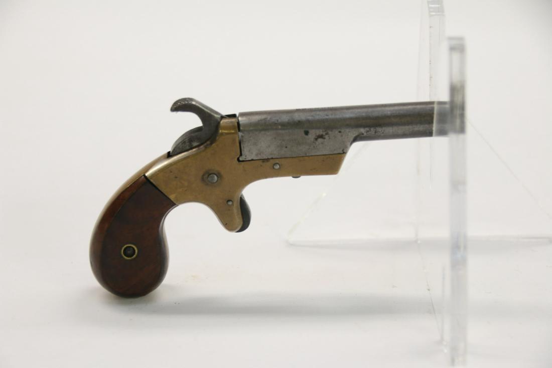 HOPKINS AND ALLEN POINTER DERRINGER: BRASS FRAME - .22CAL - SER# 67