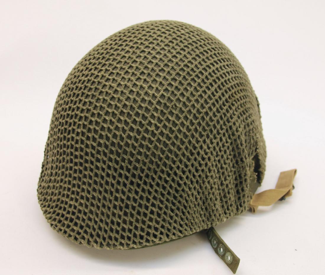 U.S. WWII FIXED BAIL PARATROOPER HELMET: INSIDE OF LINER MARKED "CAPAC" INSIDE OF CROSS - WO INSIDE OF CIRCLE - SMALL #10 AND LARGE #5 - LINER HAS SOLDIERS NAME "EBERLY"