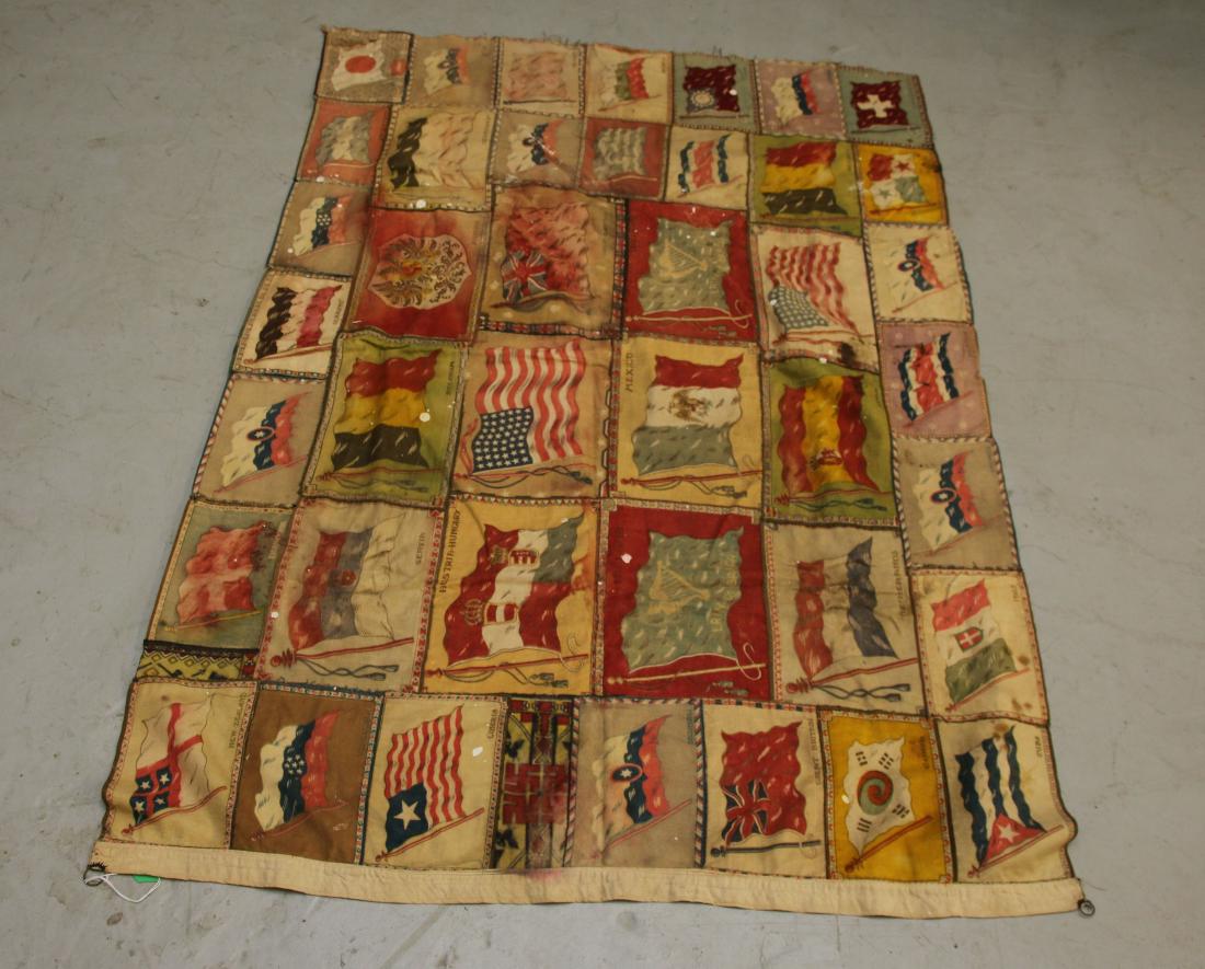 ANTIQUE PATCH QUILT FLAG: EARLY ANTIQUE FLAG COMPRISED OF 42 SILK FLAG PATCHES - U.S.A. FLAGS ARE 48 STAR 56" X 38"