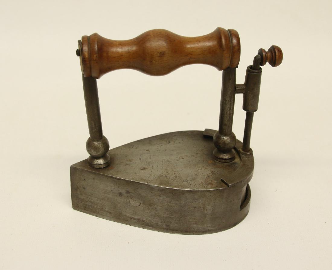 ROUND BACK IRON WITH REAR LIFT GATE (1 of 4)