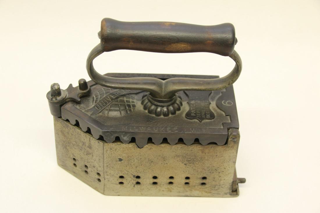 "UNIVERSAL SAD IRON" CHARCOAL: UNIVERSAL SAD IRON" CHARCOAL MILWAUKEE, WISCONSIN Dimensions: 7 1/2