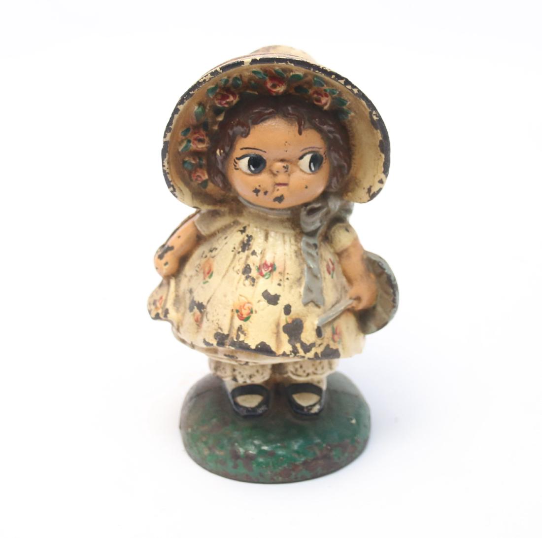 CAST IRON STILL BANK: BONNET GIRL WITH UMBRELLA 7 1/2"