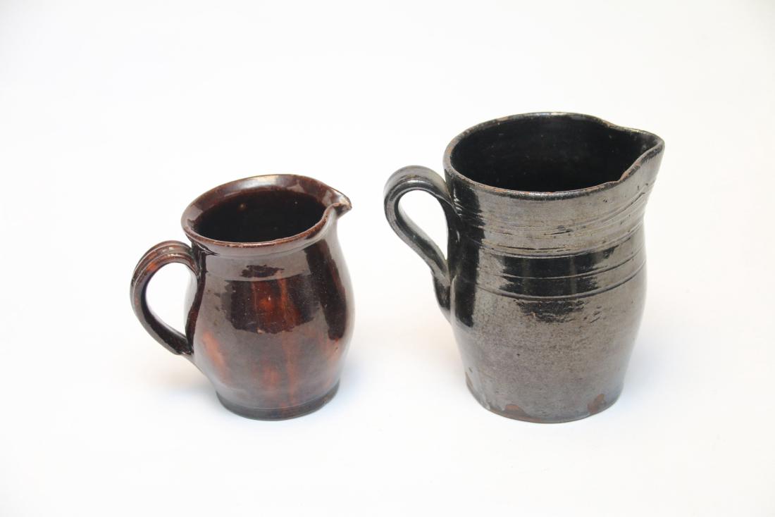 PR. OF REDWARE PITCHERS (1 of 4)
